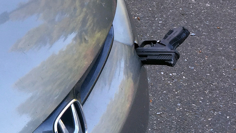 Illustration for article titled How Exactly Did A Gun Get Stuck In This Guy's Front Bumper?